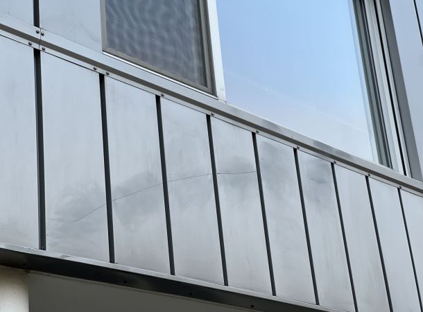 Gevelherstel woning Rotterdam metallic kleur 9007